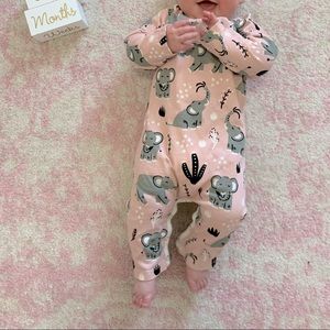 Pink elephant onesie with snap closure. Size 6 months